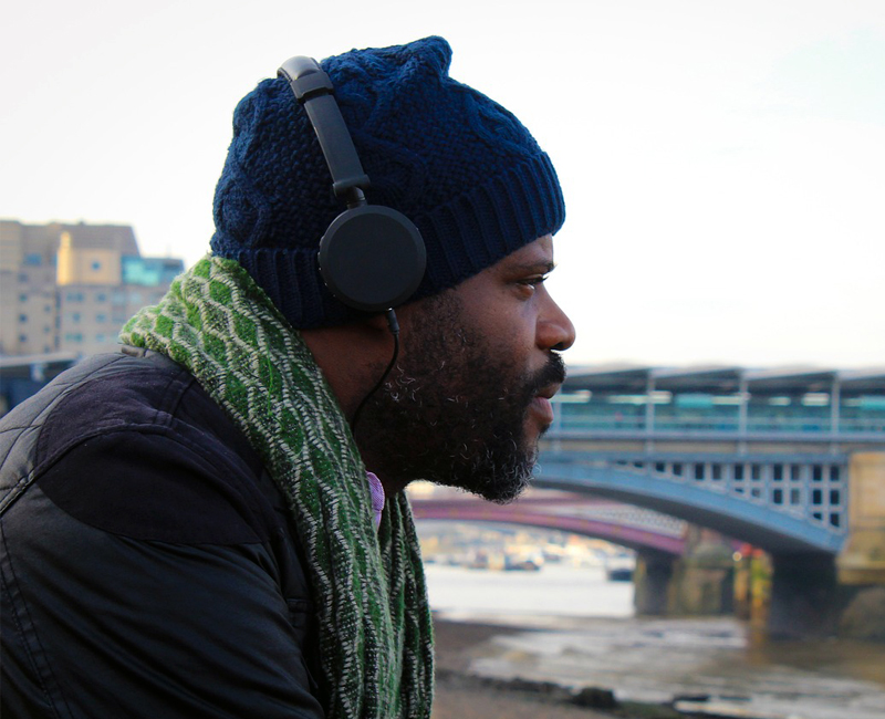 Man wearing headphones outside
